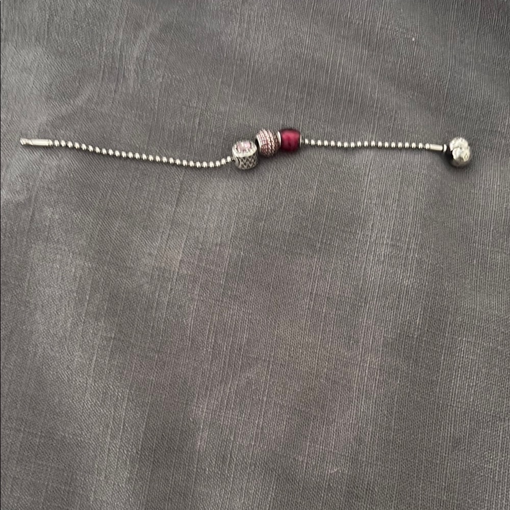 Pandora essence bracelet with charms